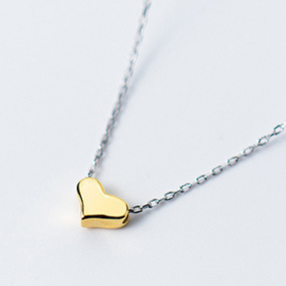 Collar de Plata con Colgante de Corazón Dorado